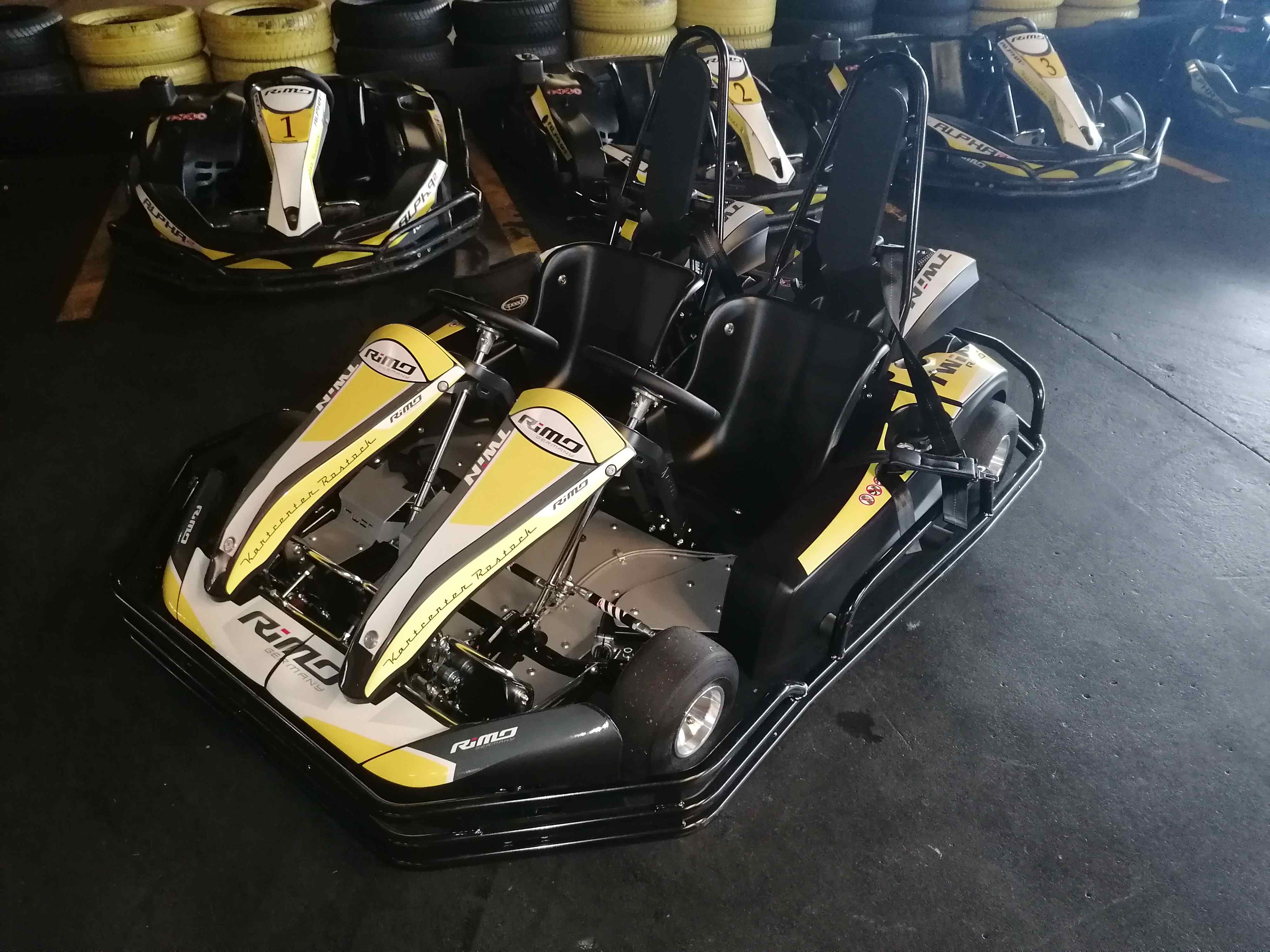 Yellow and black RiMO two-seater kart branded Kartcenter Rostock