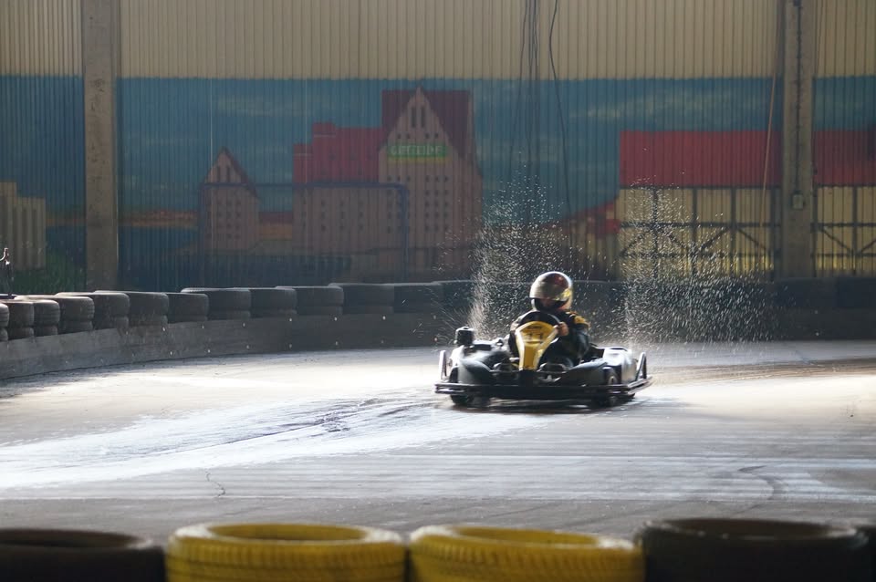 Driver in a kart on the track at Kartcenter Rostock