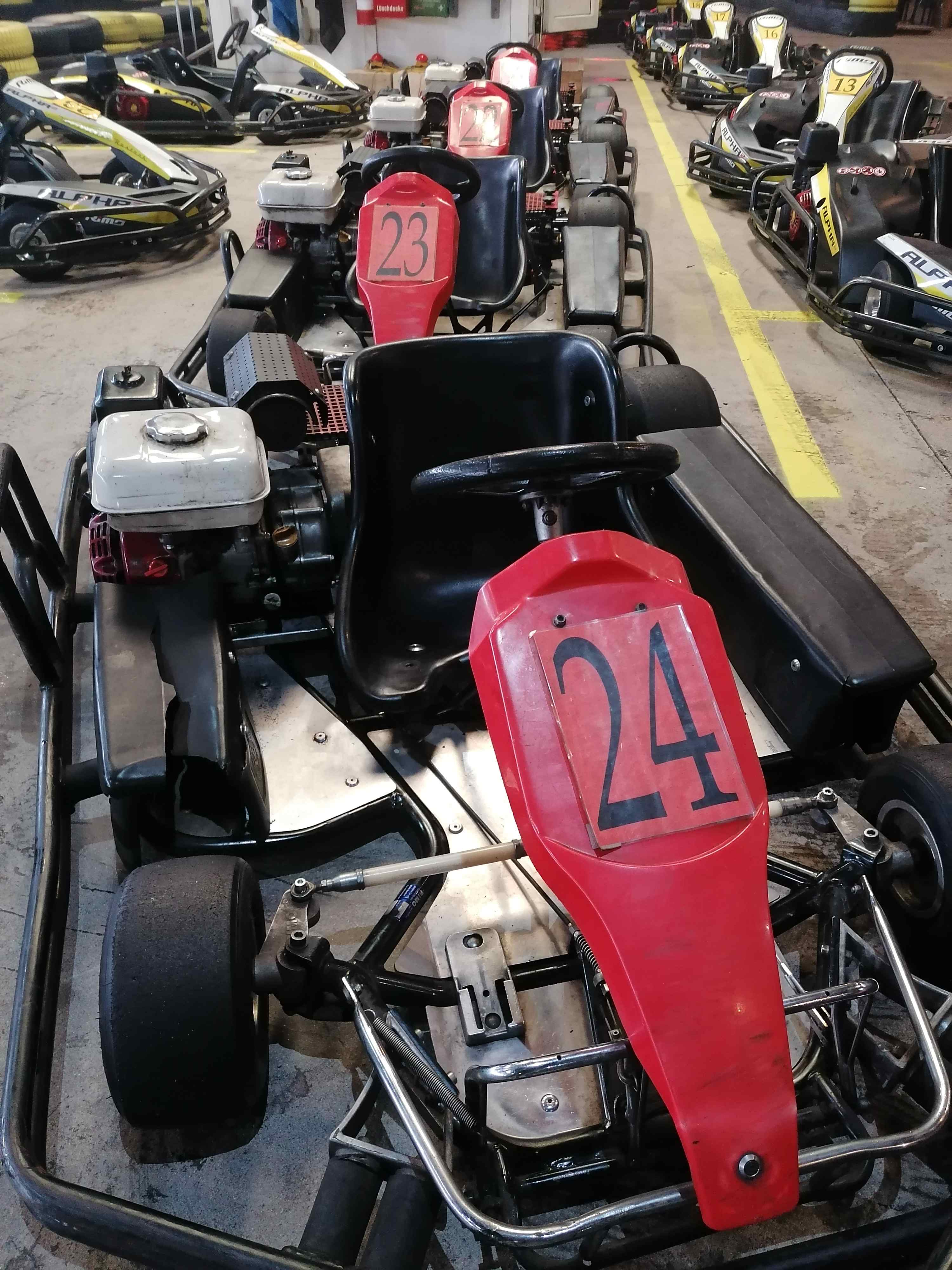 Race karts lined up in the pit lane at Kartcenter Rostock